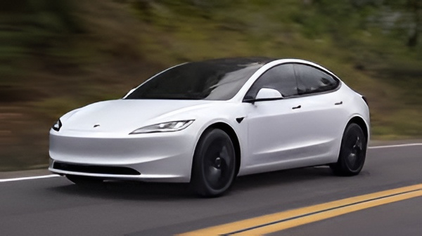 "Interior of a Tesla Model 3 featuring a minimalist dashboard and central touchscreen display."