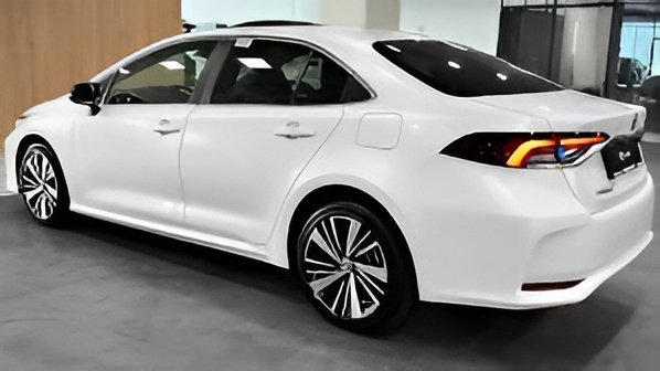 Toyota Corolla parked on a city street showcasing its modern sedan design and stylish exterior.