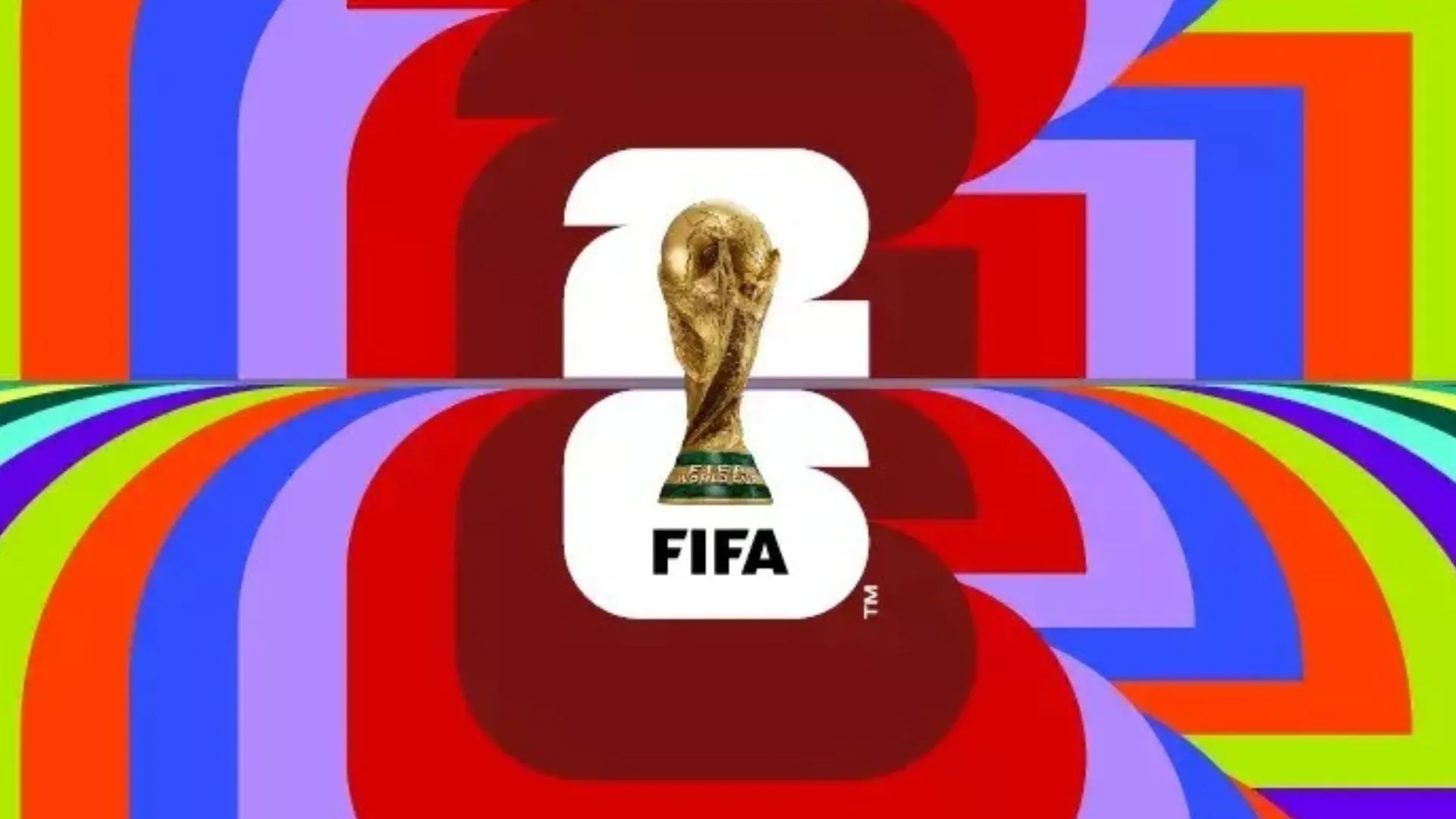 FIFA World Cup 2026 trophy displayed with football and stadium lights